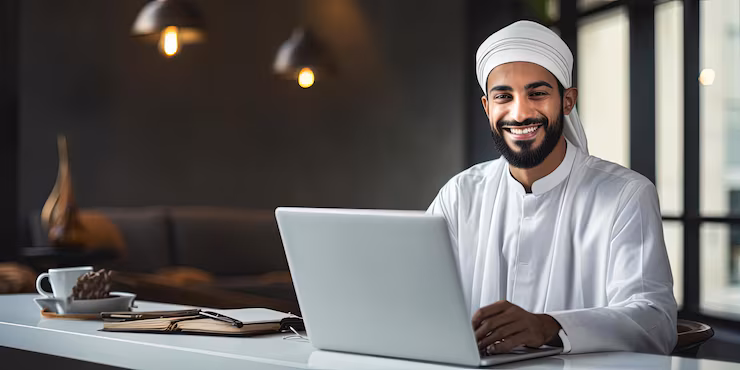 Adult practicing Noon Sakinah and Meem Sakinah rules while reciting the Quran online